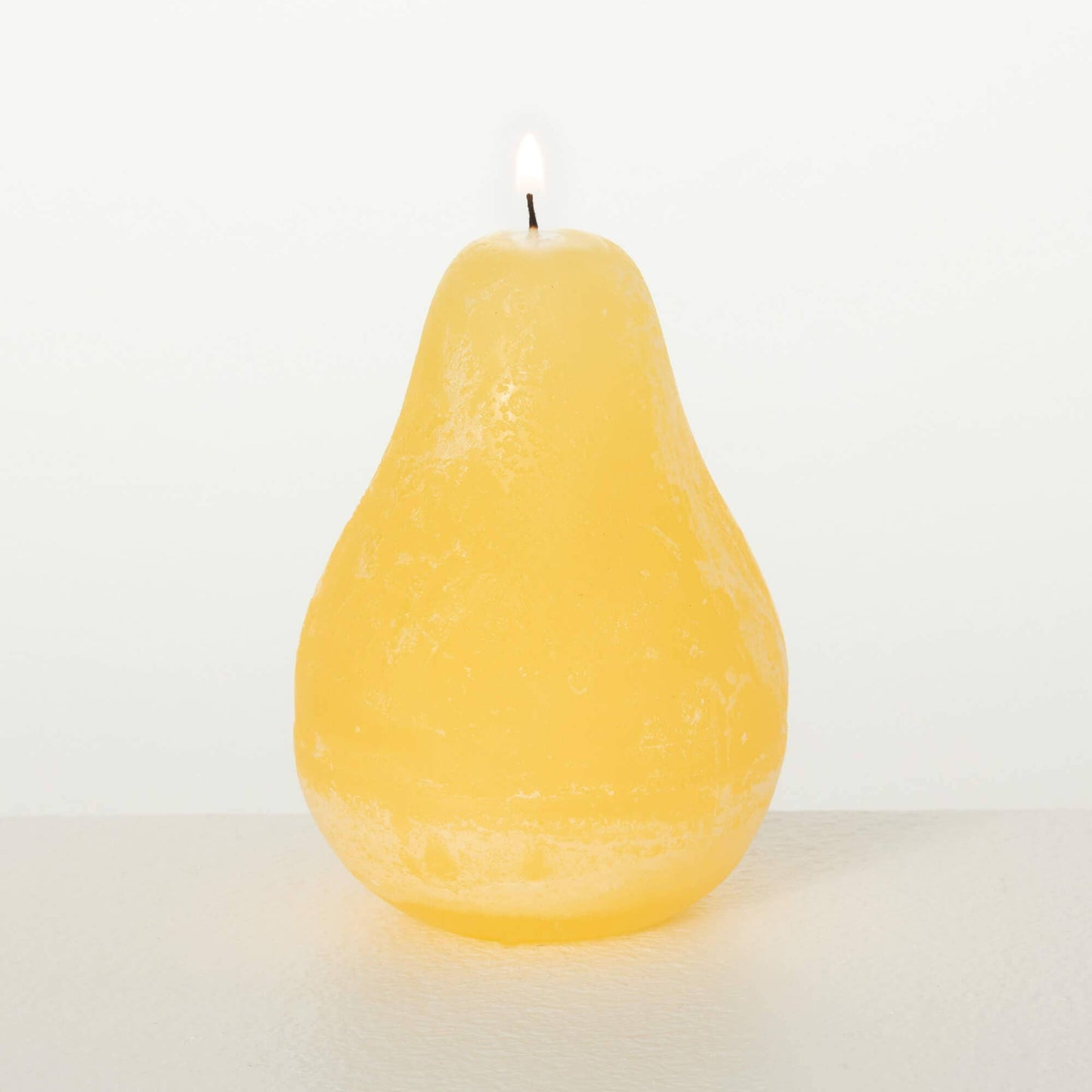 
                  
                    WARM YELLOW TIMBER PEAR CANDLE
                  
                
